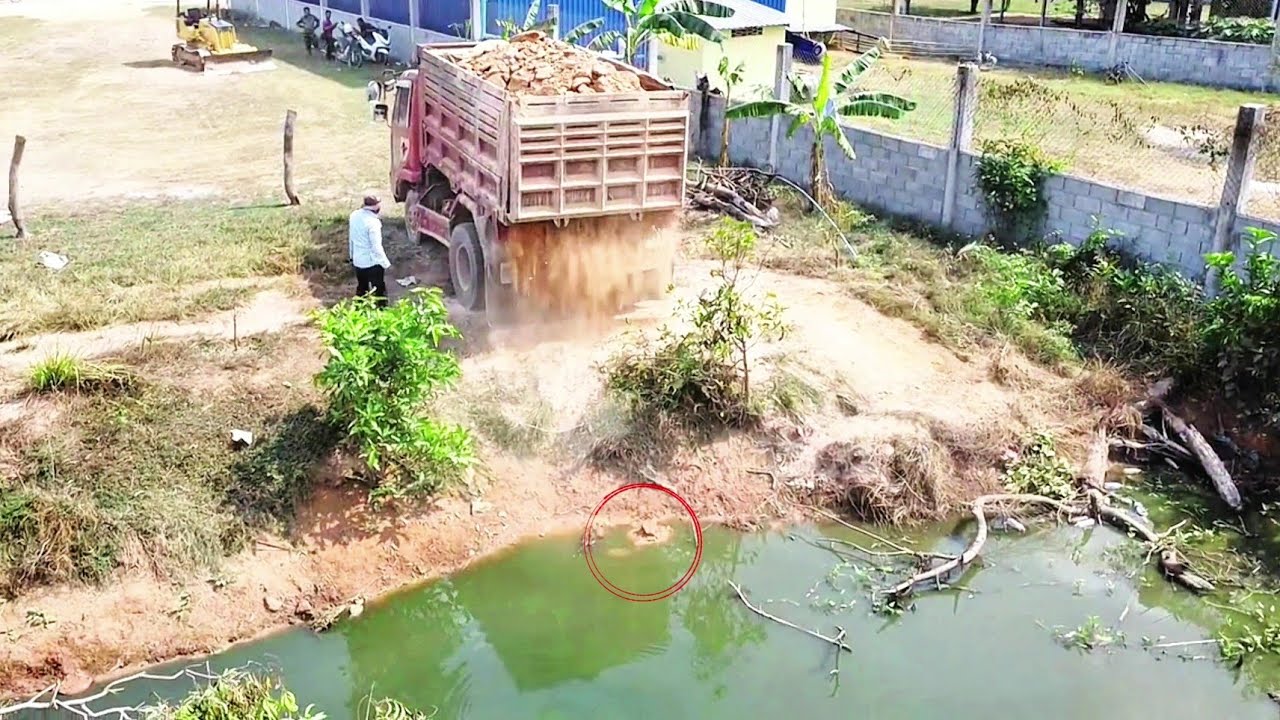 First Start New Project!! Activities of the 5-ton trucks pour soil & pushing soil by Dozer D20A