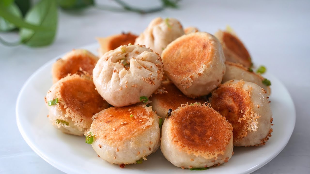 Homemade Chinese Pan Fried Buns (生煎包) filled with juicy pork & cabbage