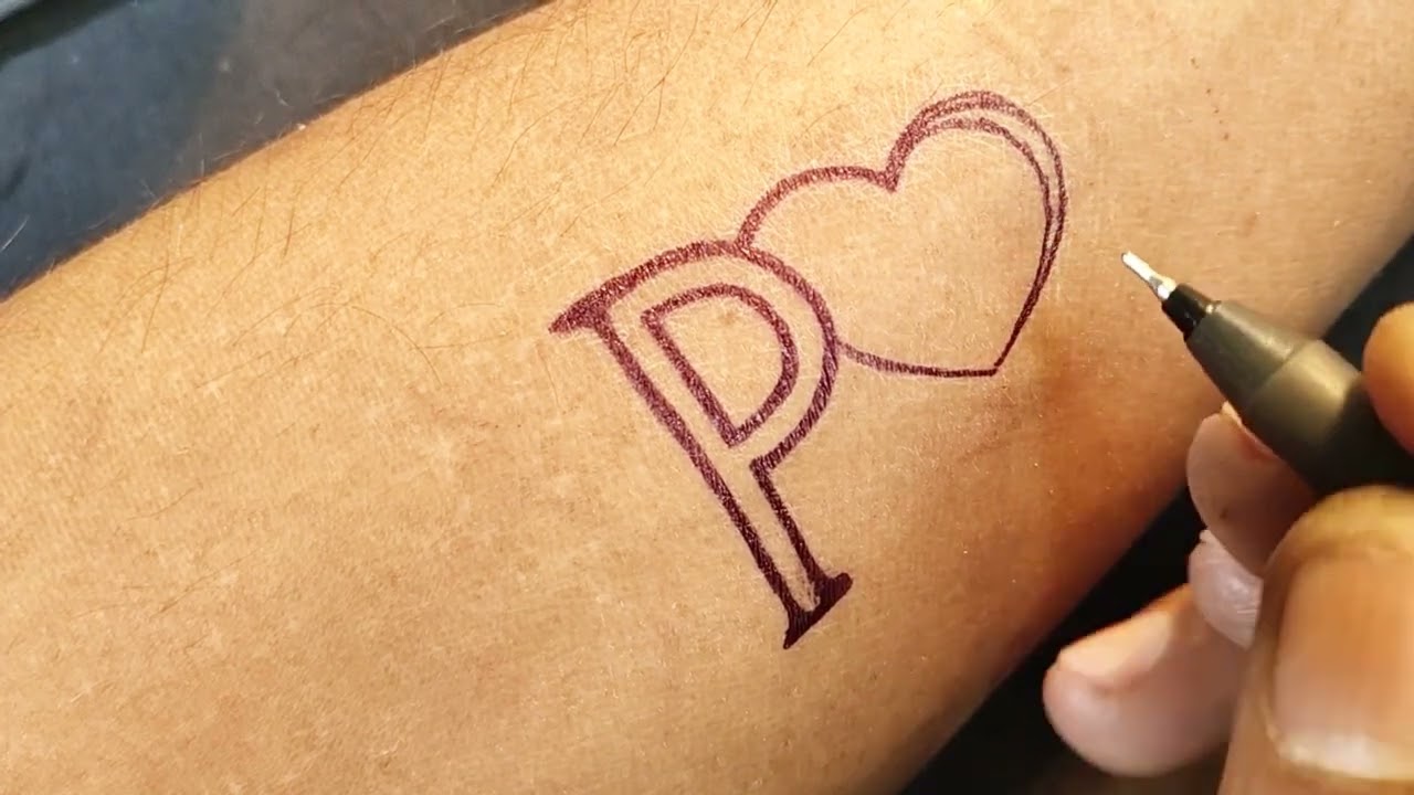 P letter tattoo design on hand for girl with pen idea | Tattoo style