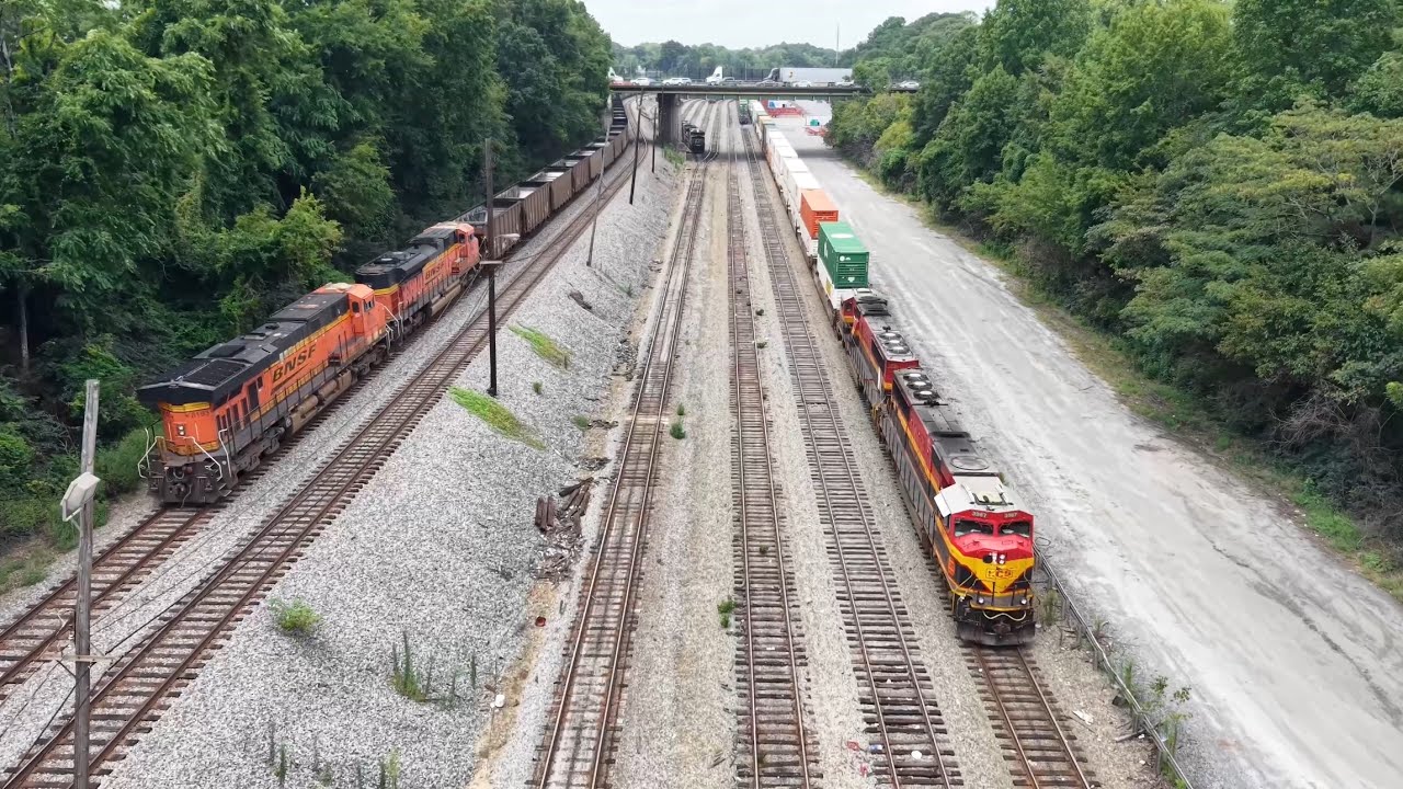 A BNSF Coal Train Passes a KCS at Inman, CSX and NS Freights at Howell and the Overpass