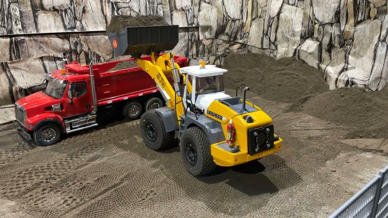 Rc 4ever... Bruder Liebherr 574 loading the Granite Mack, Volvo A60H, 49x Western Star, & Huina 582