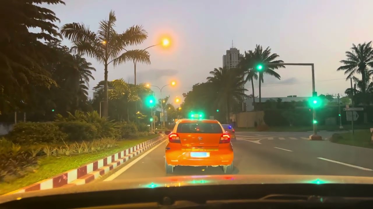 Night Ride Through Abidjan: Plateau to Palmeraie, Passing the South African & Rwandan Embassies!