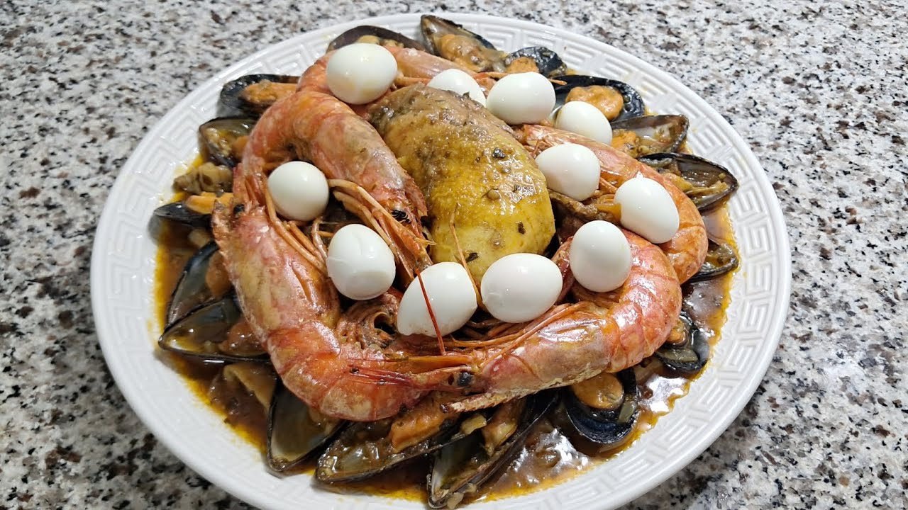 Langostinos i mejillones con pollo