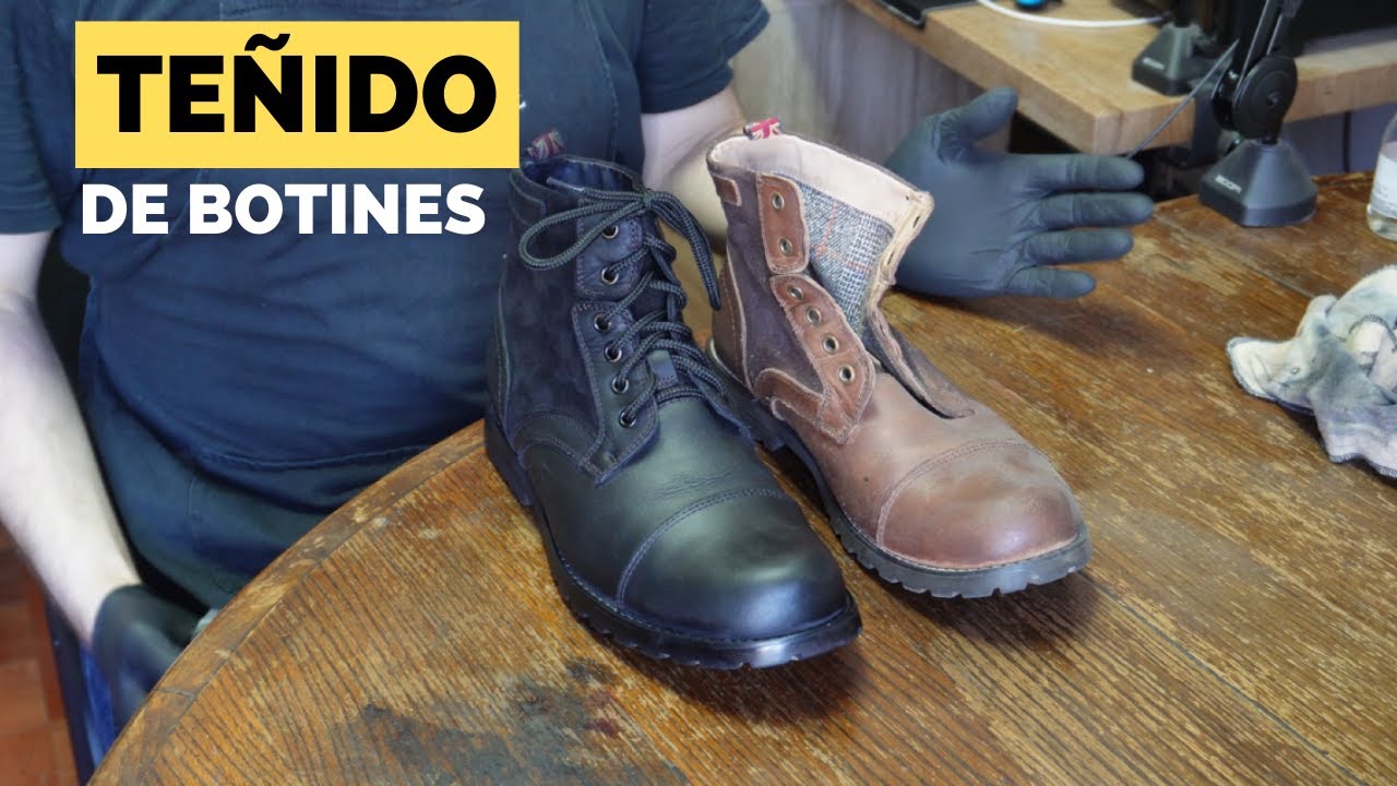 Teñido de botines de cuero café de cuero graso a color negro