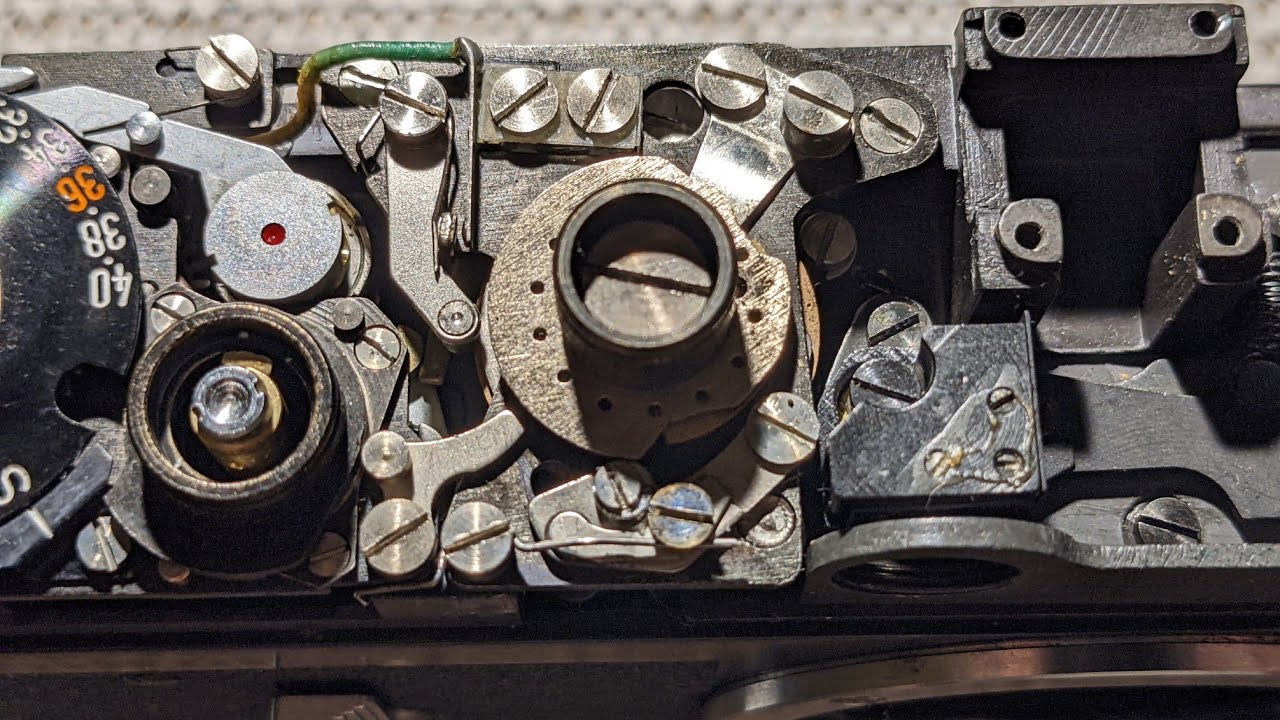 How to fix Canon P shutter mechanism (high/slow speed adjustment points)