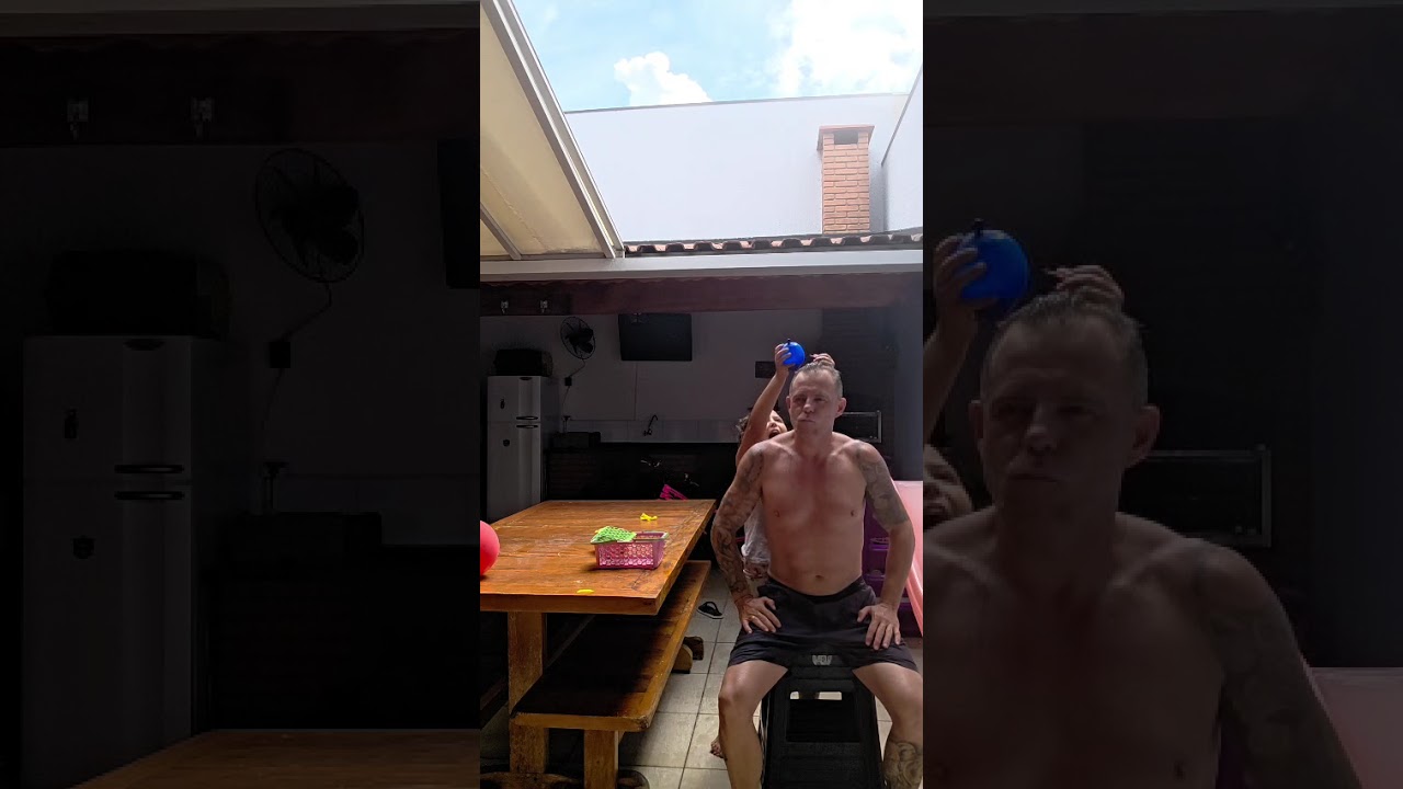 Brincadeira  do  balão  com água a