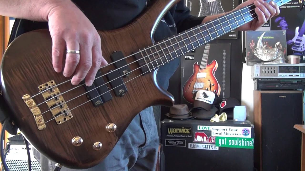 Flat vs Round wound bass strings  - The Lowdown  - Andy Irvine