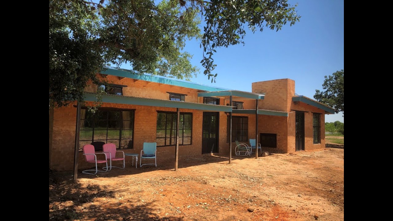 Sustainable building using compressed earth blocks