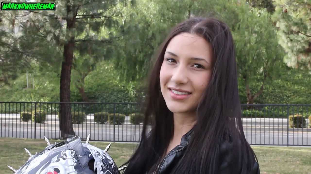 A Beautiful DUCATI Female Motorcycle Rider on the street
