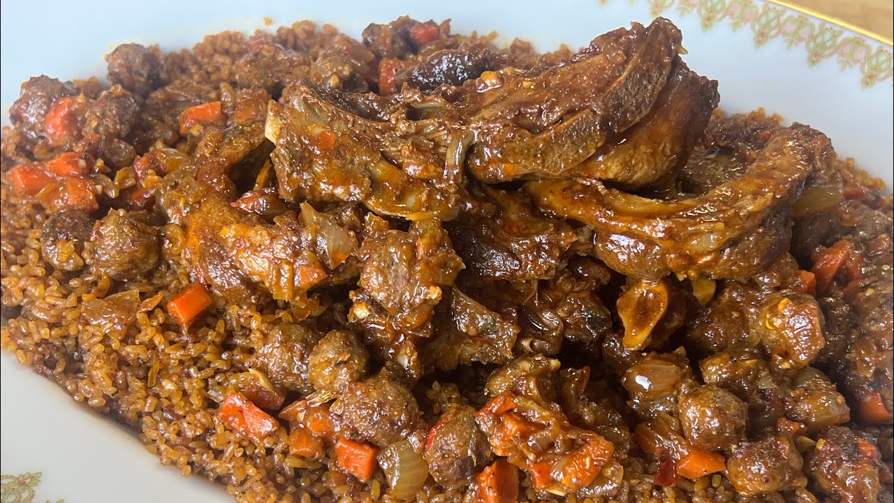 Thiebou Yapp Diaga bou khonk/Lamb and Beef Jollof rice