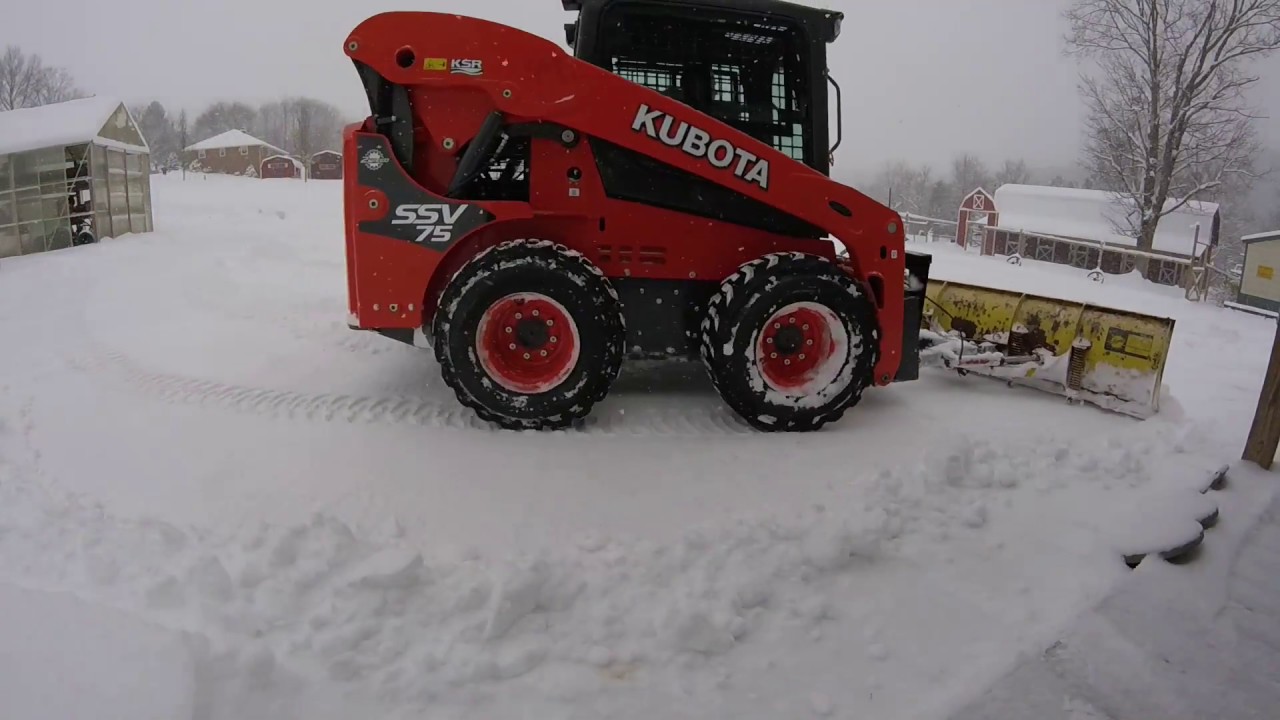 Snow Plowing with our Kubota SSV 75 skidsteer