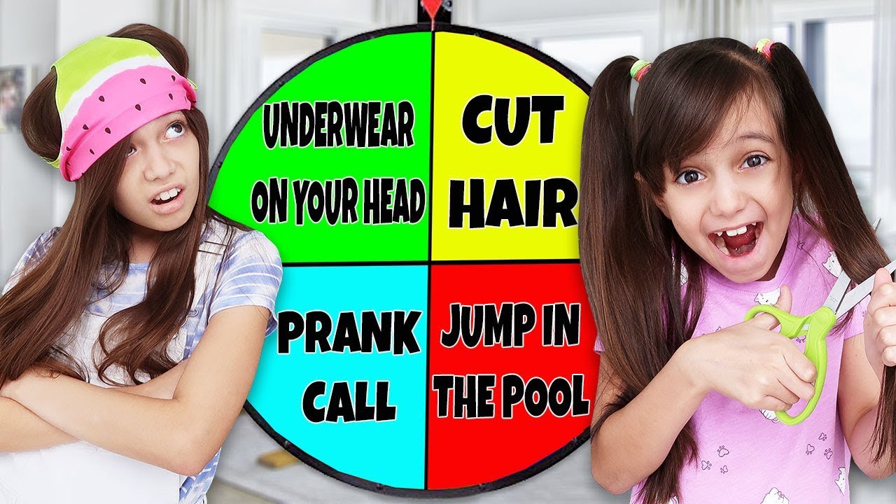 SPIN The MYSTERY WHEEL & DOING Whatever It Lands On! LAST TO CHALLENGE | Emily and Evelyn