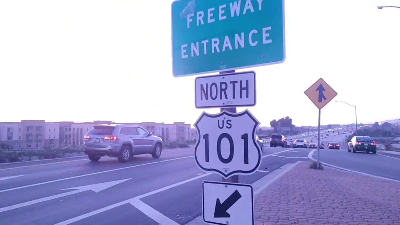 Late afternoon. At the highway overpass