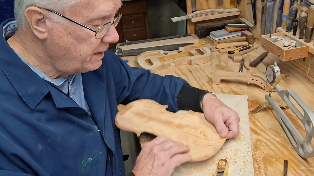 Graduating the back of the cherry violin to the ideal thickness. 