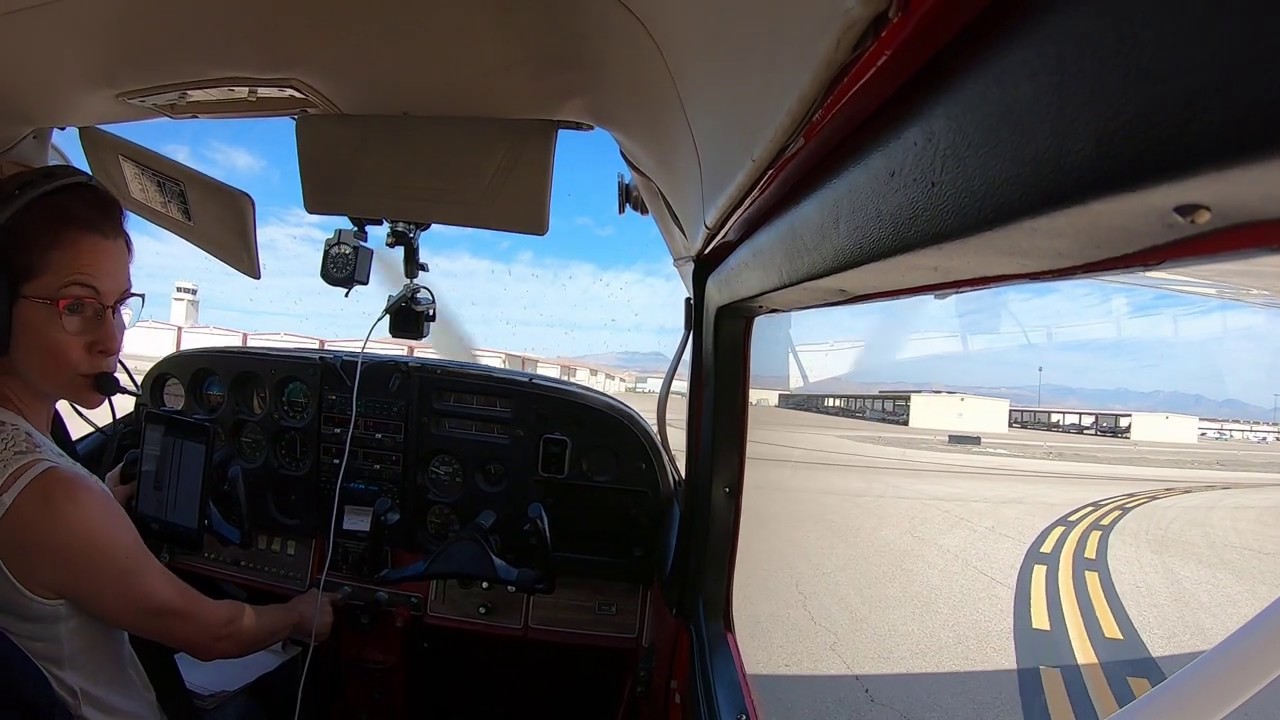 VFR final approach and taxi to Henderson Executive FBO (with ATC calls) KHND