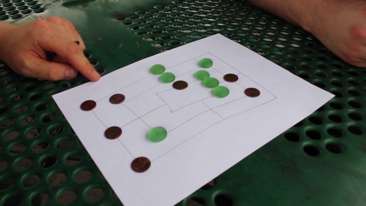 Playing Nine Men's Morris with Dog and Thimble