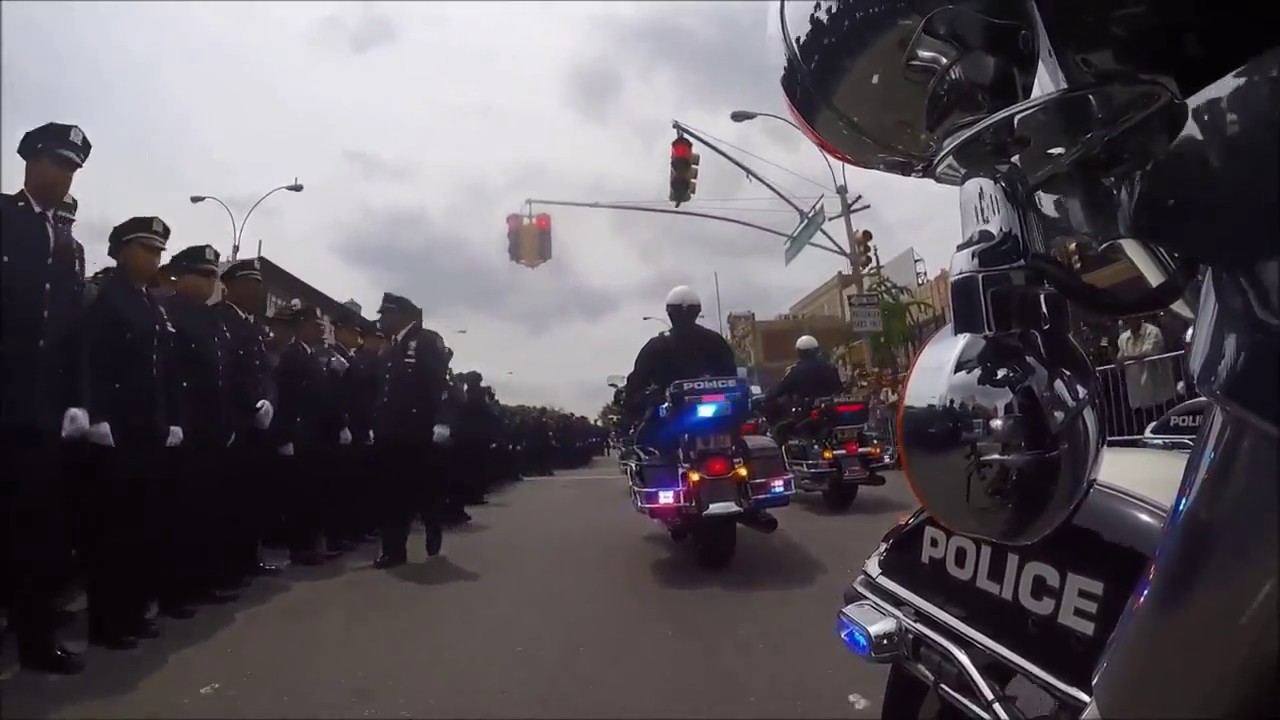 Thousands pay tribute to fallen police officer in moving funeral procession