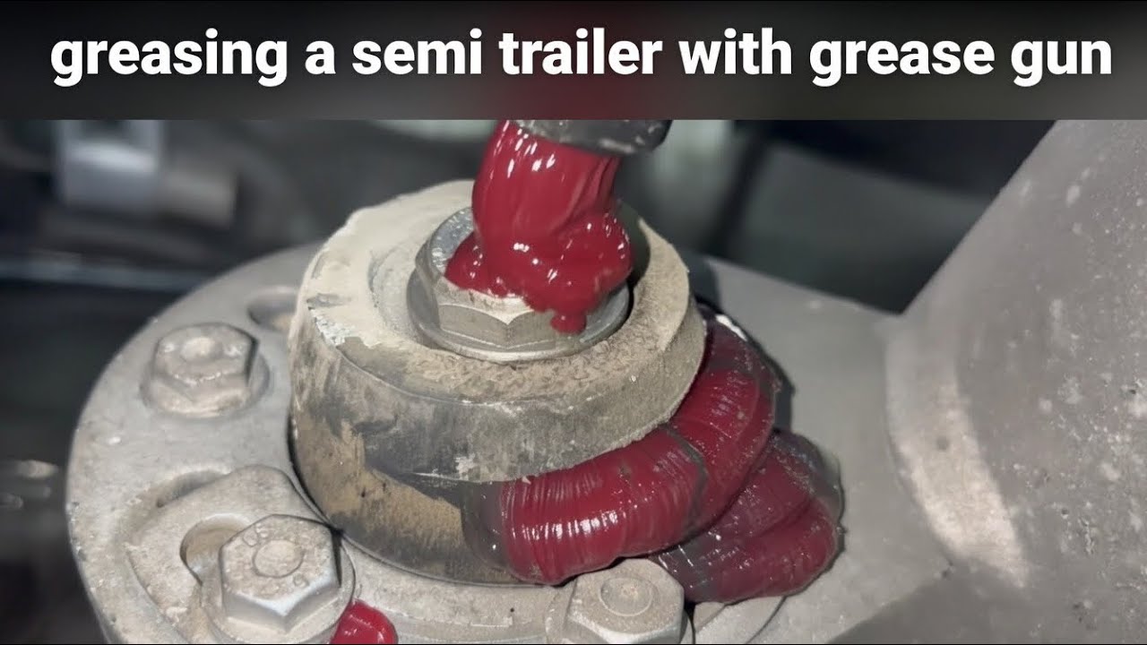 Greasing a semi trailer with grease gun 