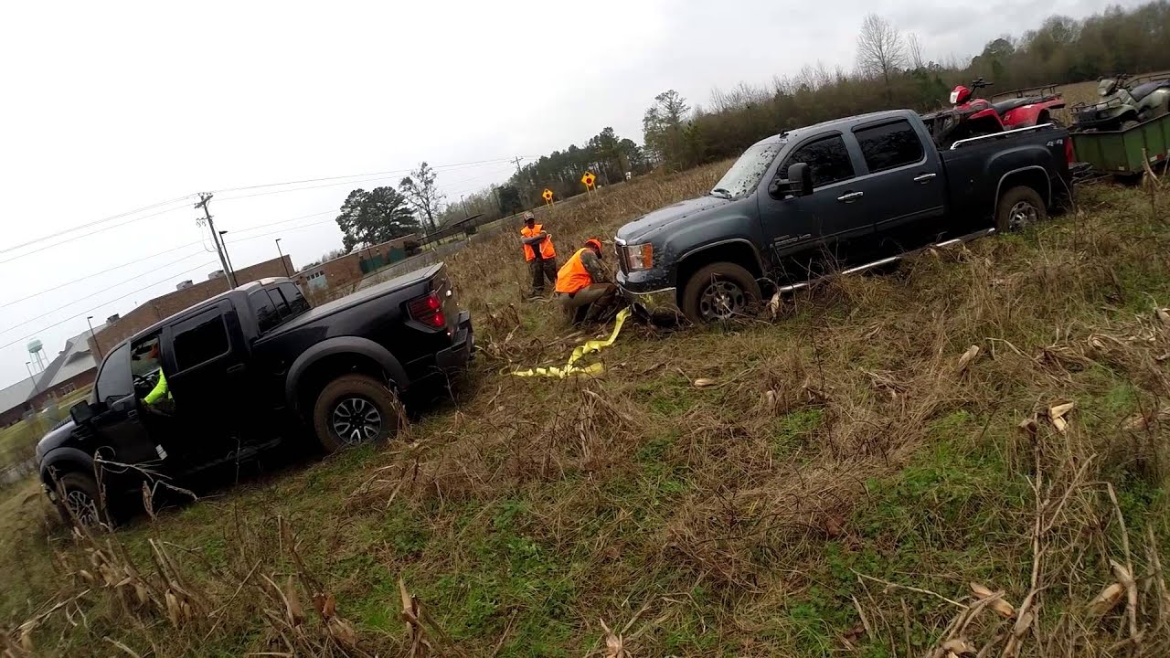Ford Raptor pulls out Chevy 2500 HD with trailer and 4wheelers