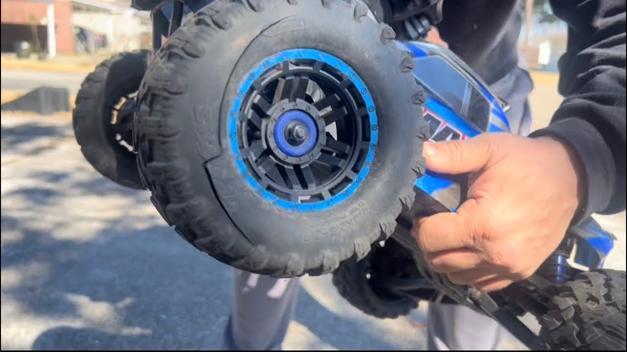 Traxxas max blown tires doing backflips 