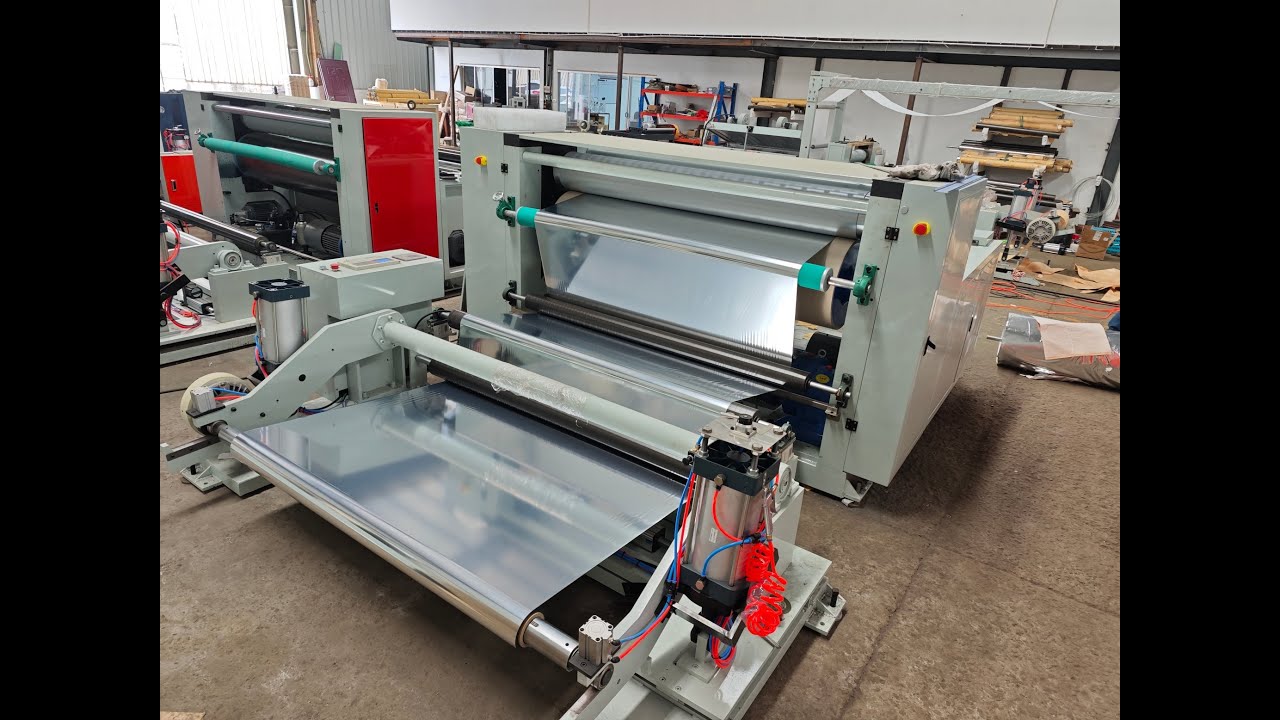Plastic film embossing machine