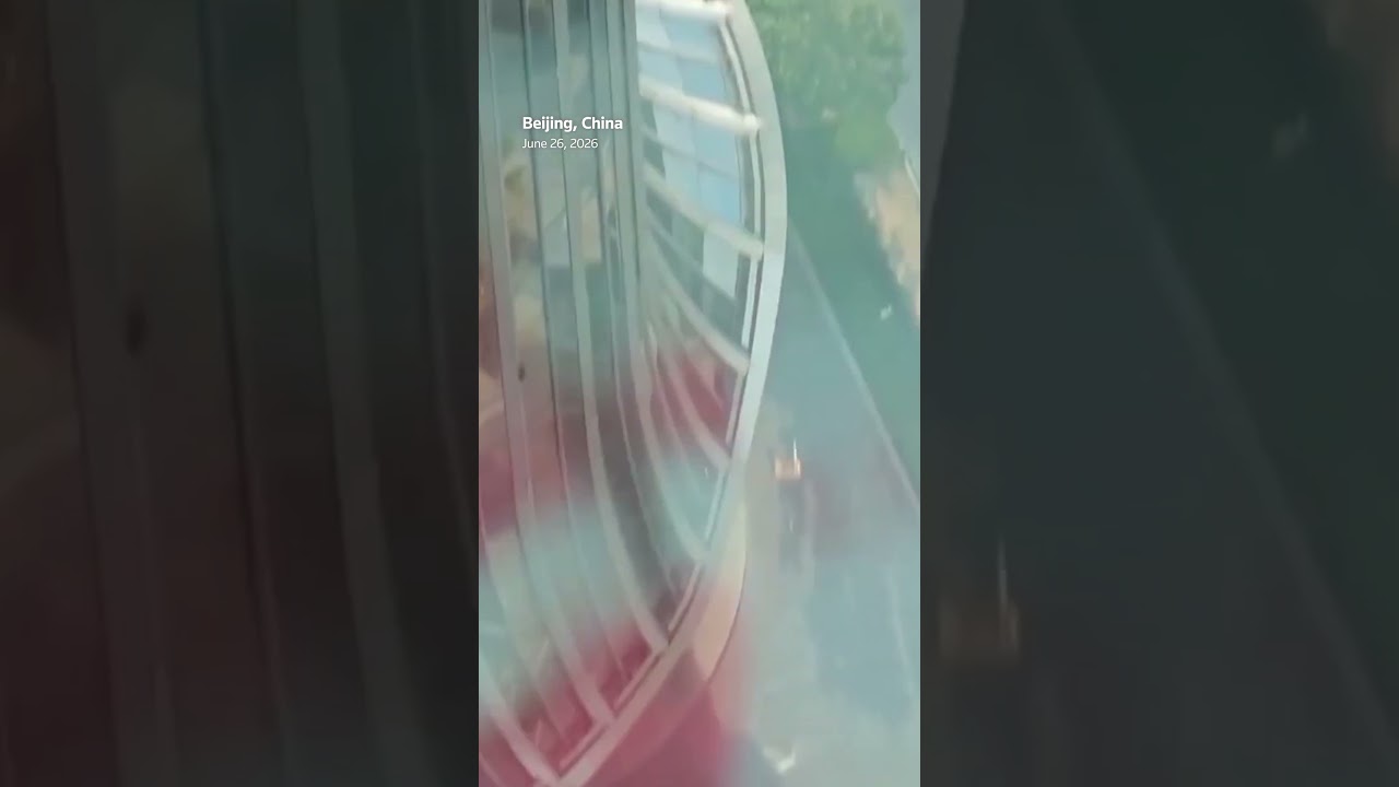 Small aircraft crashes into Beijing skyscraper