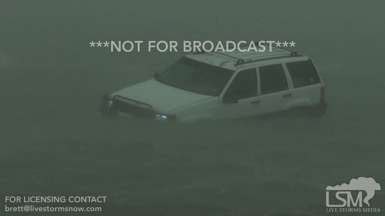 8-25-2017 Corpus Christi, Tx Hurricane Harvey, car stranded in water people rescued surge over roads