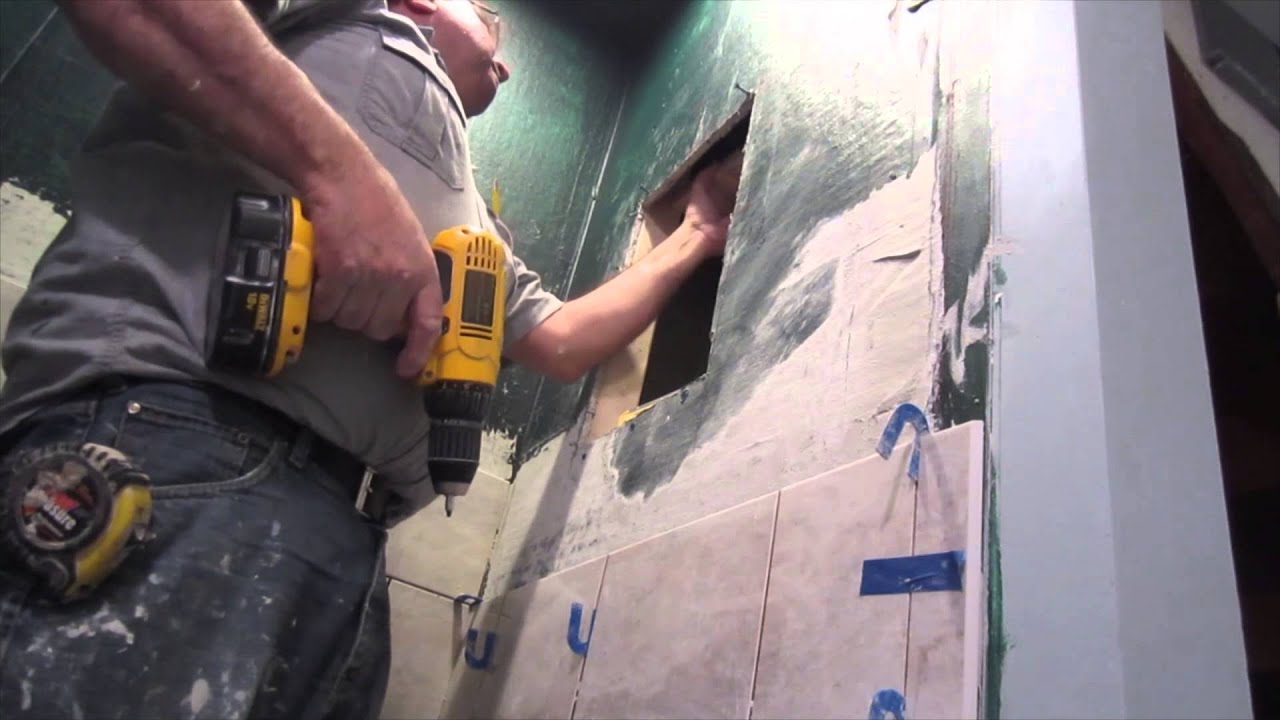How to build a recessed niche in a shower.