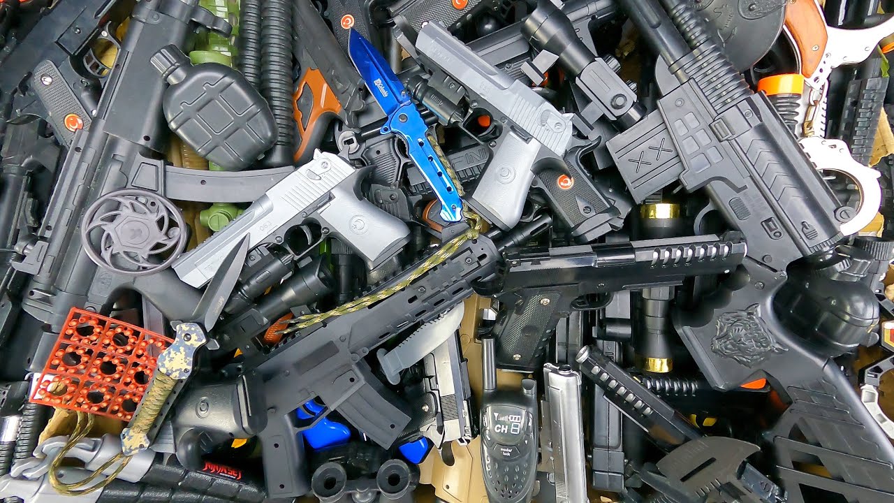 Box of Dangerous Bead-Firing Pistols and Rifles, Toy Sound and Light Rifles, Sniper Rifles, Shotguns