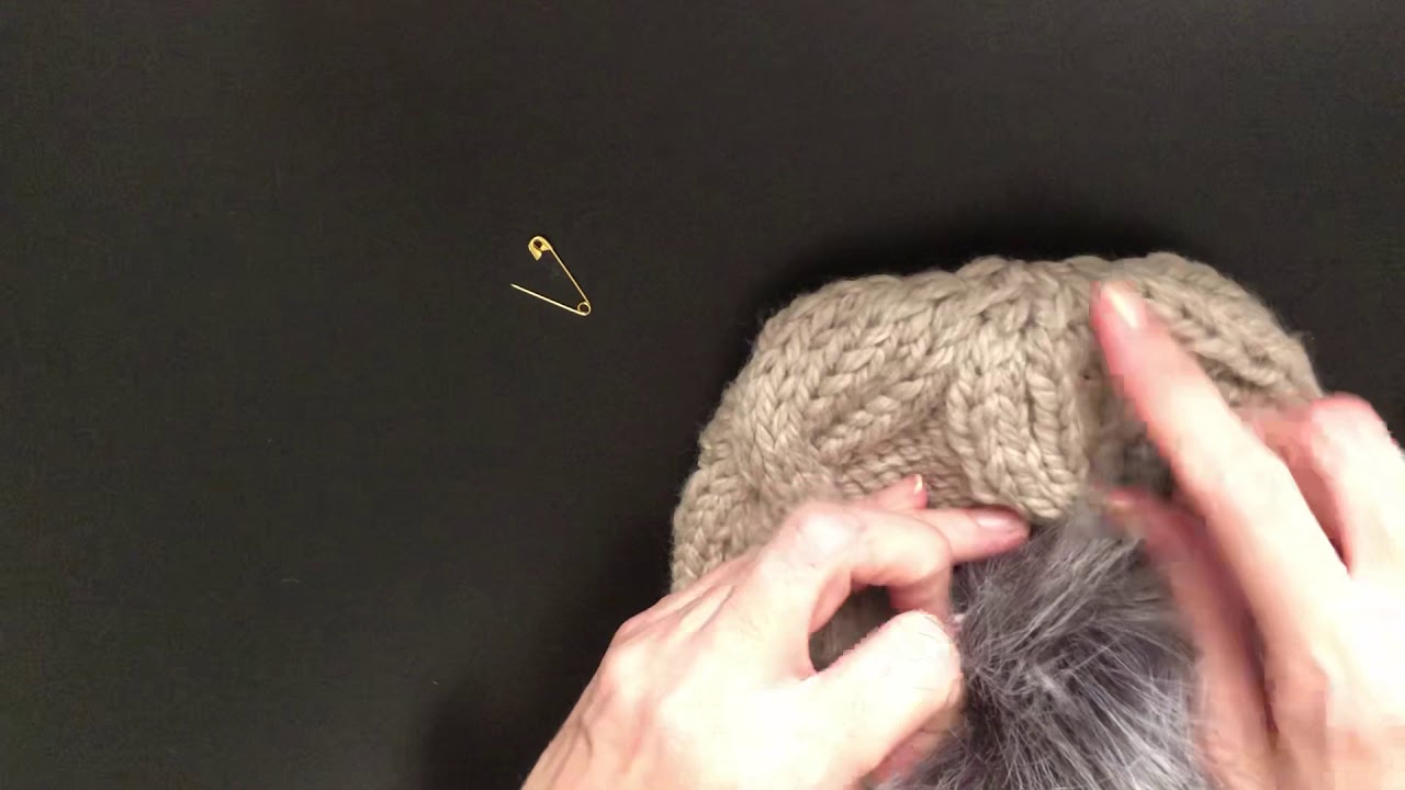Attach a pompom to a hat in seconds