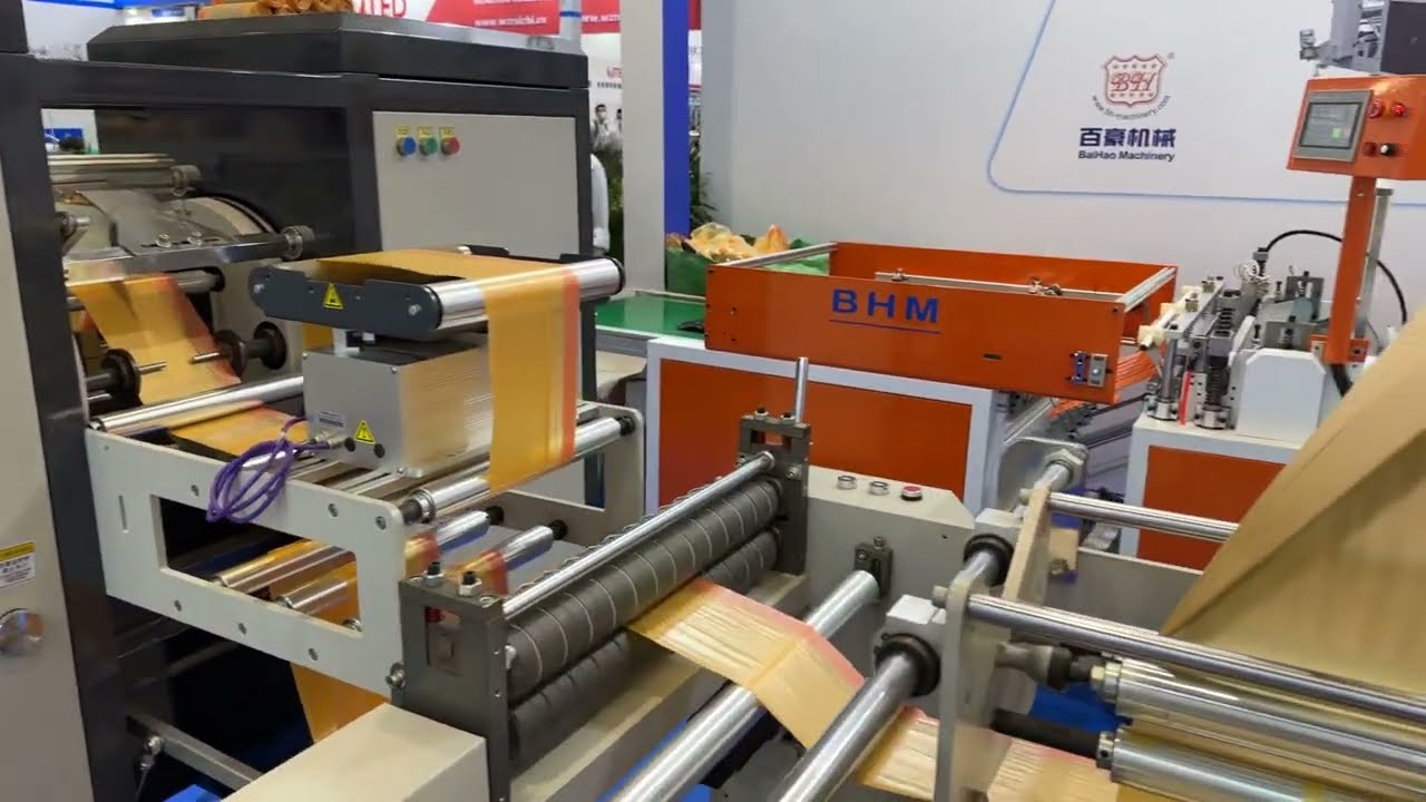Chinaplas 2023 drawstring garbage bag on roll machine with auto sticker whatsapp:0086-13616770683