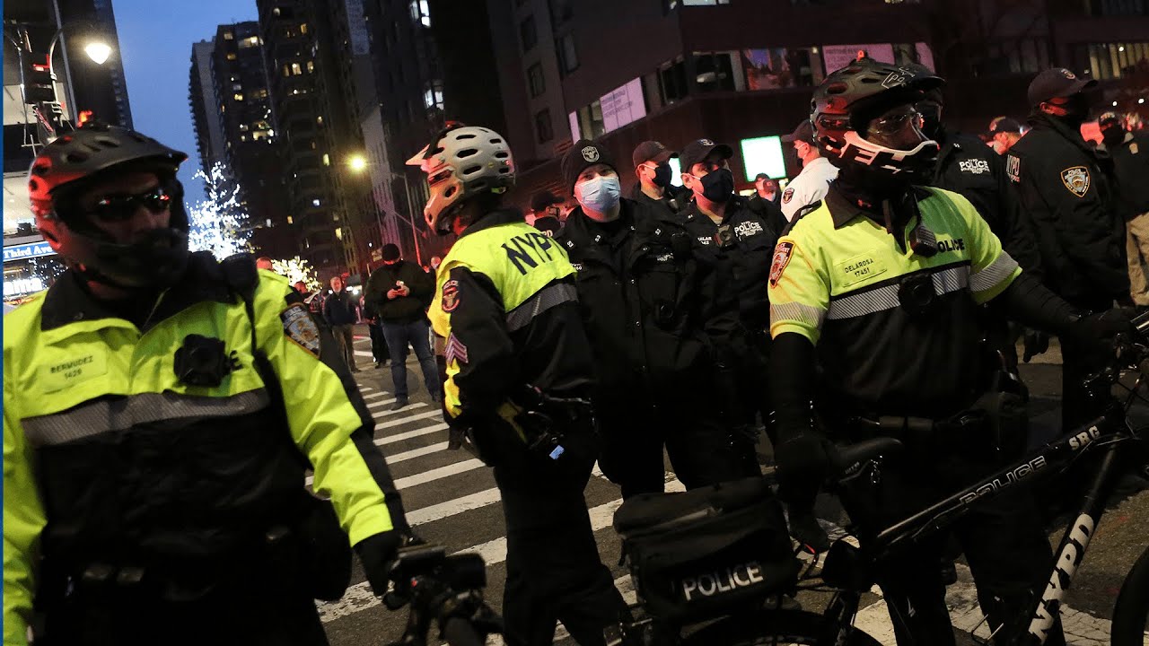 Driver ploughs into 50 protesters in New York, injuring six