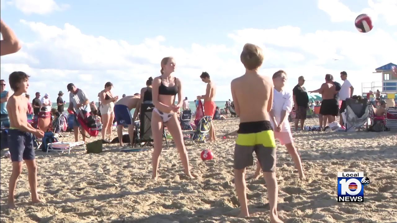Tourists in South Florida enjoying warm weather while most of country endures chilly conditions