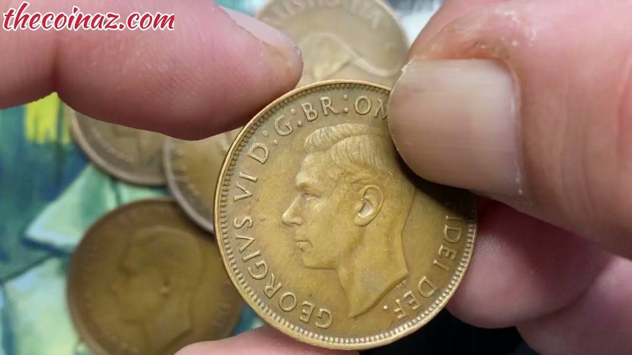 Старые британские монеты достоинством в один пенни: Георг V, Елизавета II.