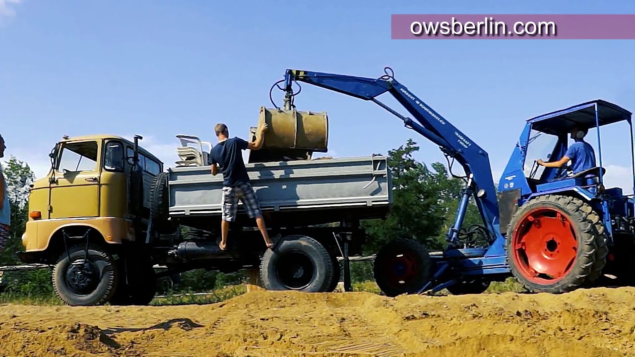 Excavators Digging in the Sand and Operator View | Universallader T157 / 2 Empor