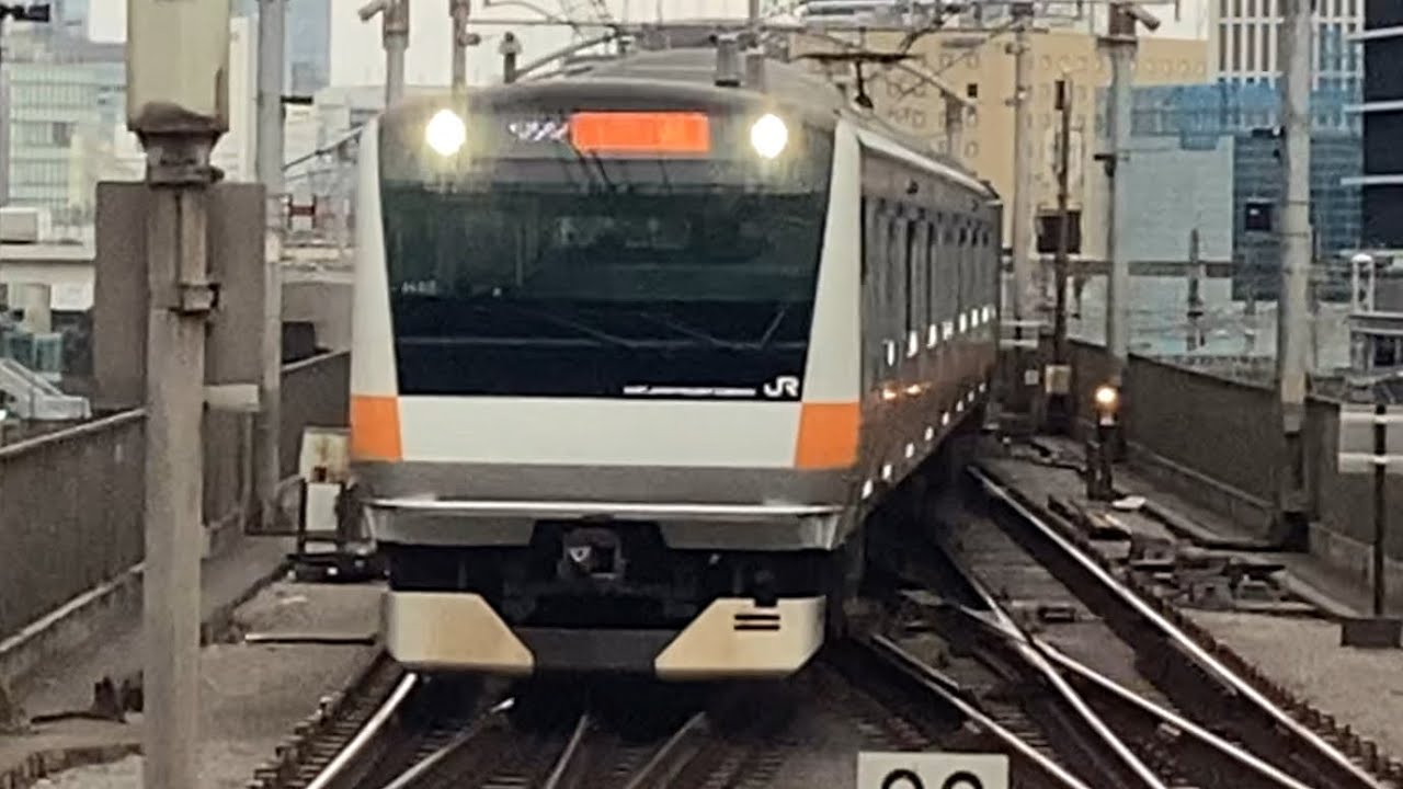 E233系0番台ﾄﾀH58編成が快速東京行きとして東京駅に入線するシーン