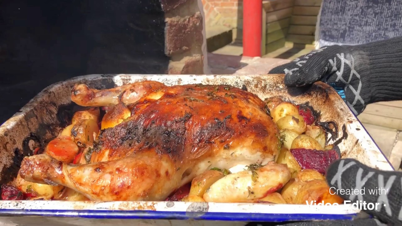 Delicious smokey wood fired roast chicken in the pizza oven