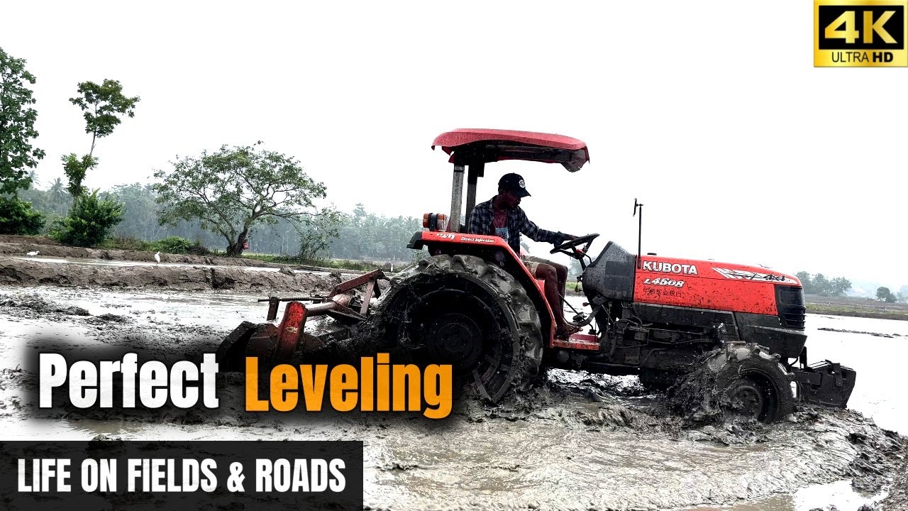 Watch This Tractor Perfectly Level a Paddy Field