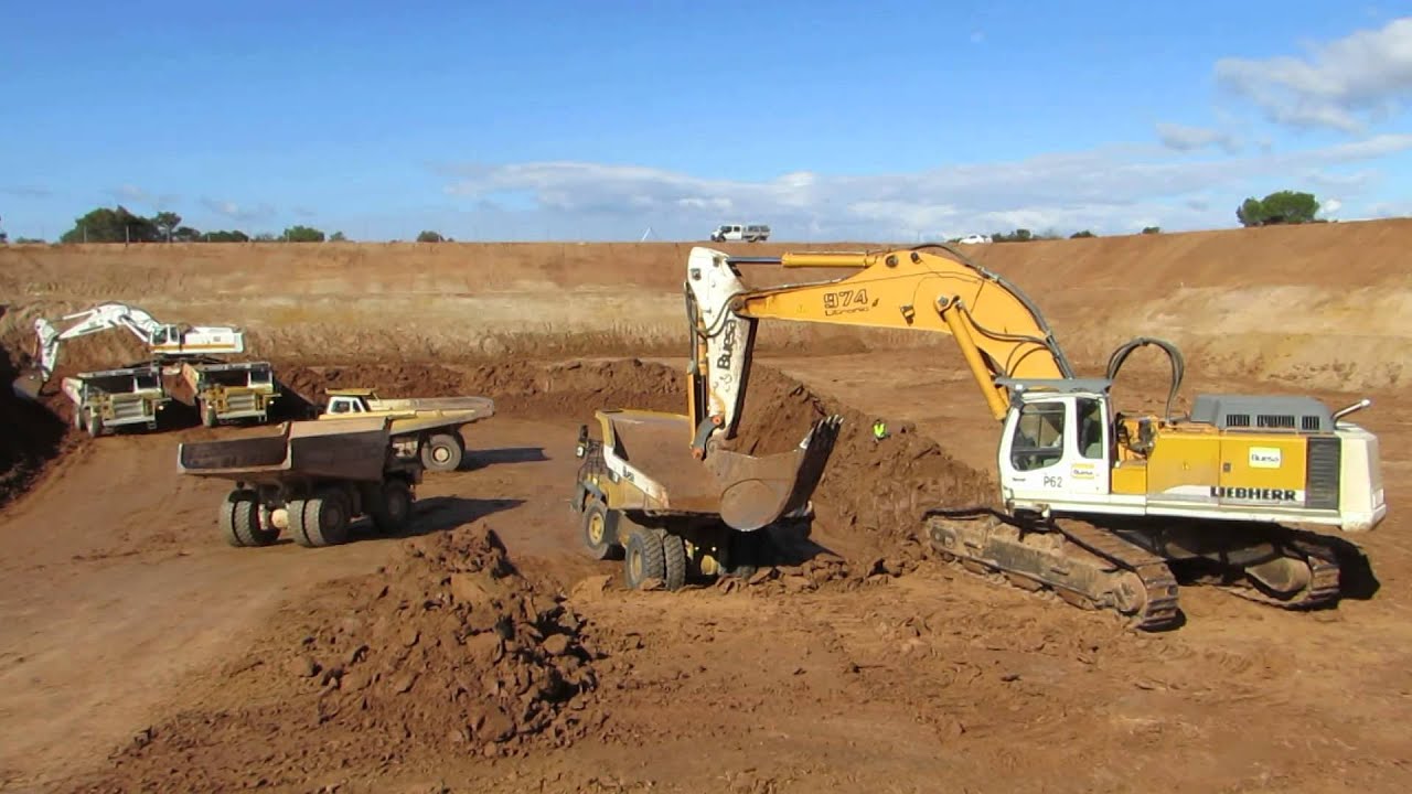 Liebherr R974B and R974C loading 769D