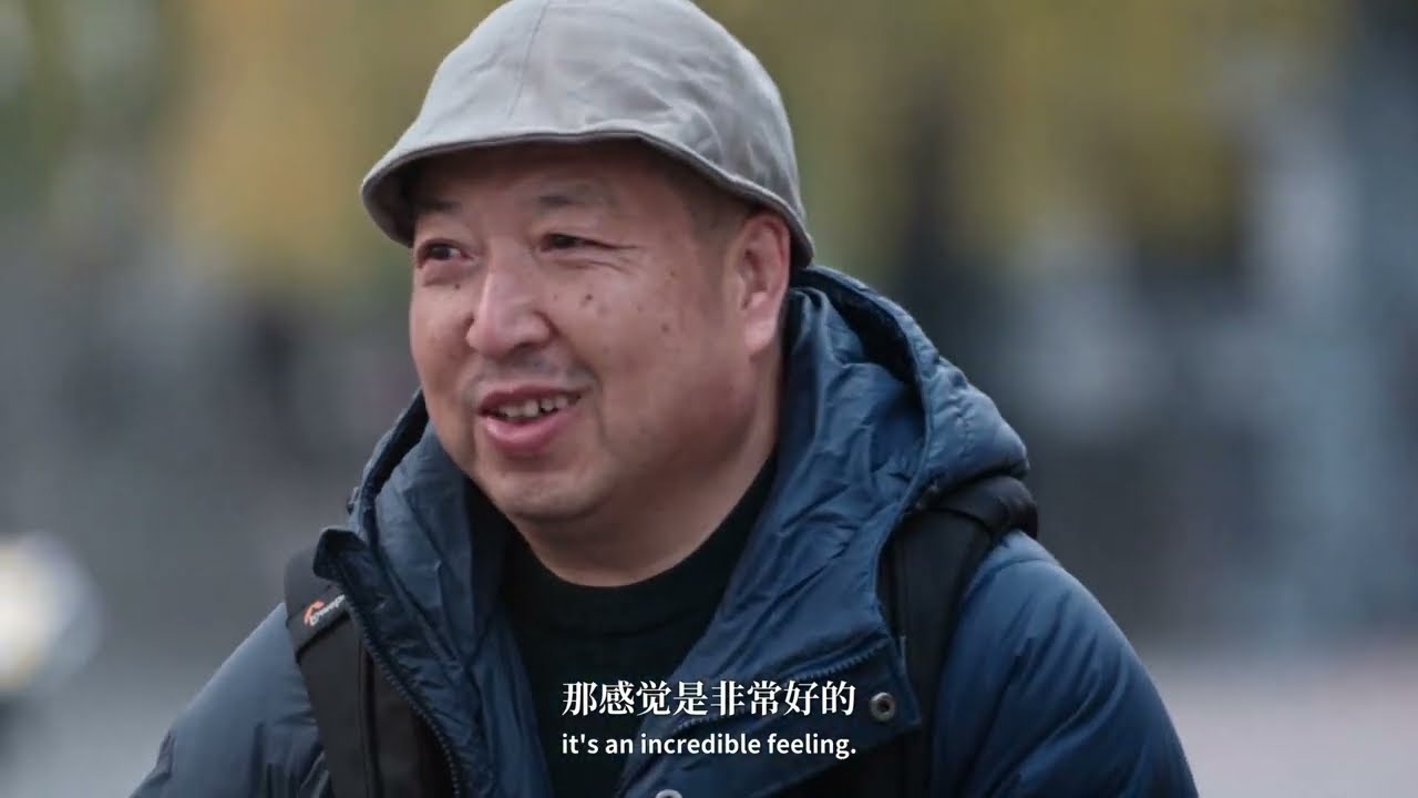 Zhou Li: Half a lifetime behind the lens, capturing Longmen’s timeless grace.