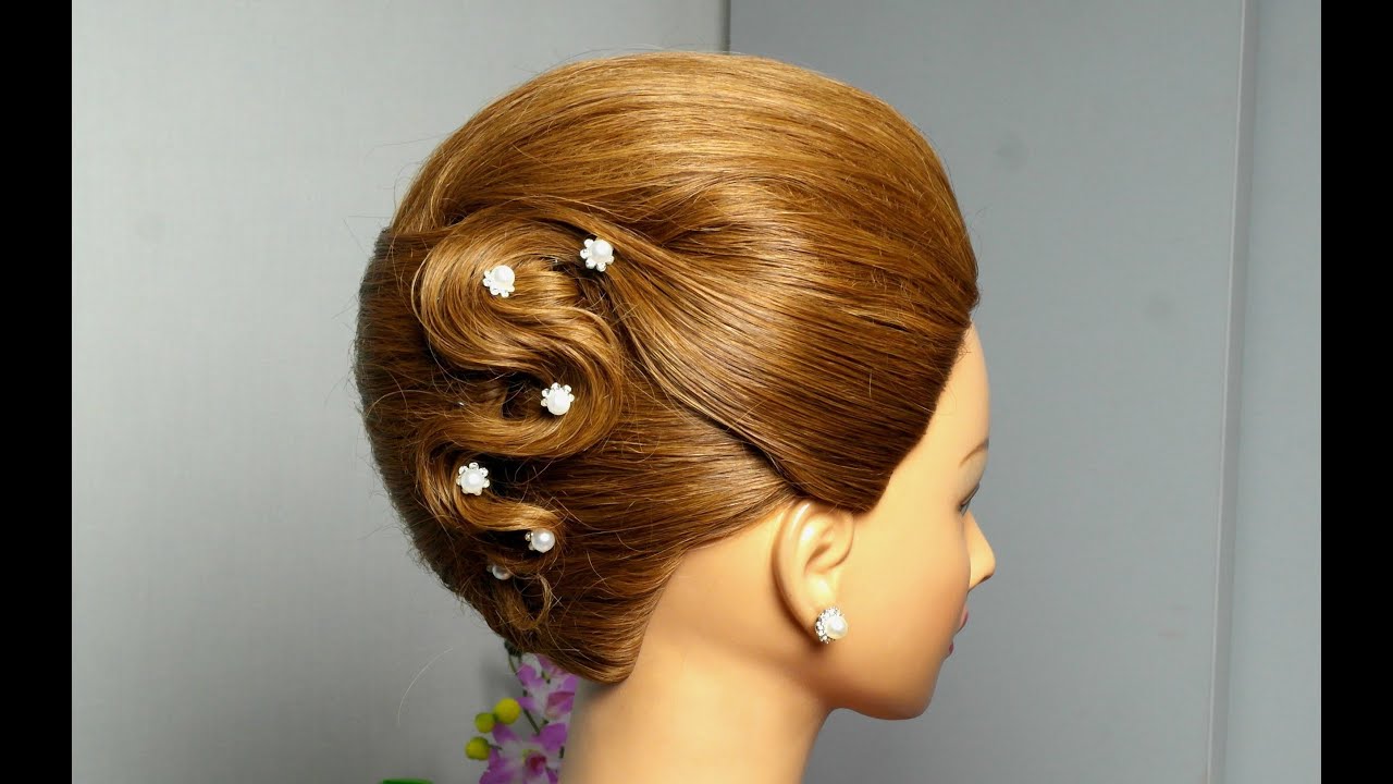 French twist hairstyle for long hair. Elegant updo.
