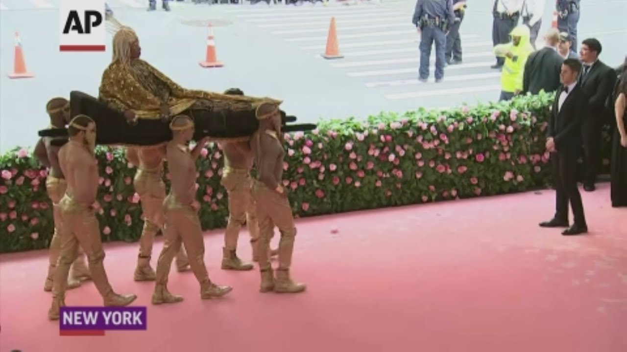 Forget walking: Billy Porter carried in to Met Gala