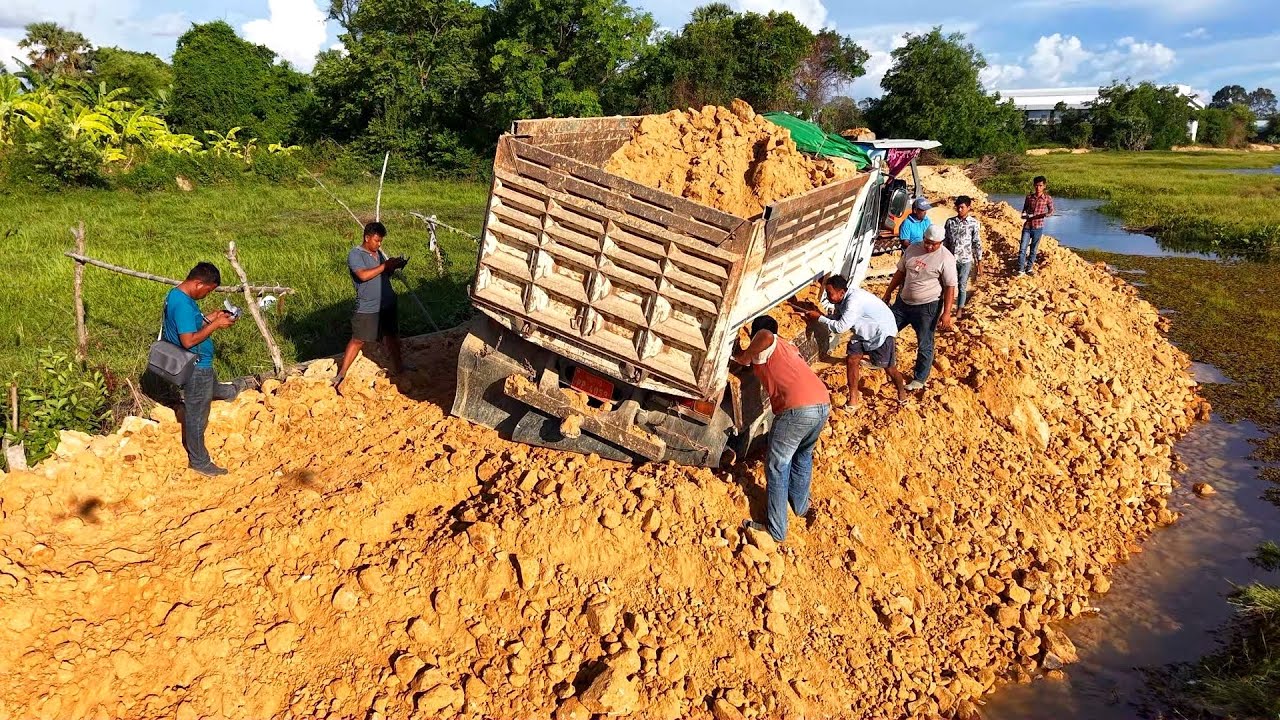Incredible!! Dump Truck 5ton Drive Back Uploading Landslide Overturned into Water Bulldozer Komatsu