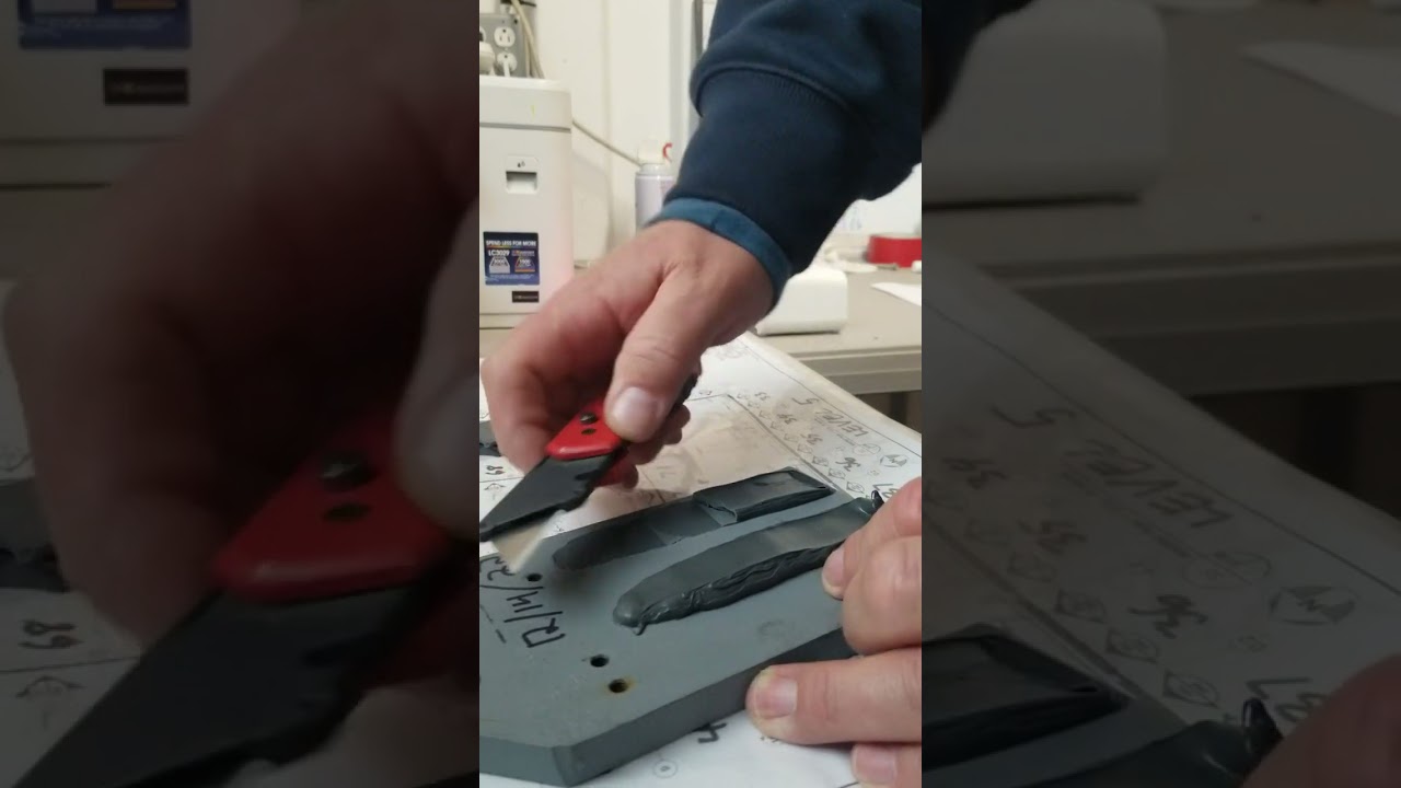 Pull test on cured Dowsil 795 for adhesion to primed steel. 1-5-23