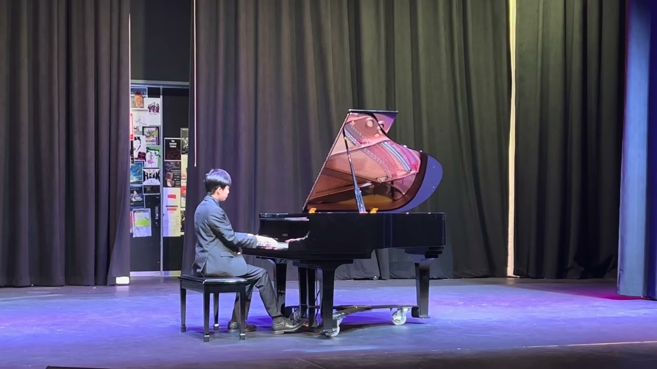 KhaiAn- art gala playing piano - he was so nervous playing for peers - Feb 2026
