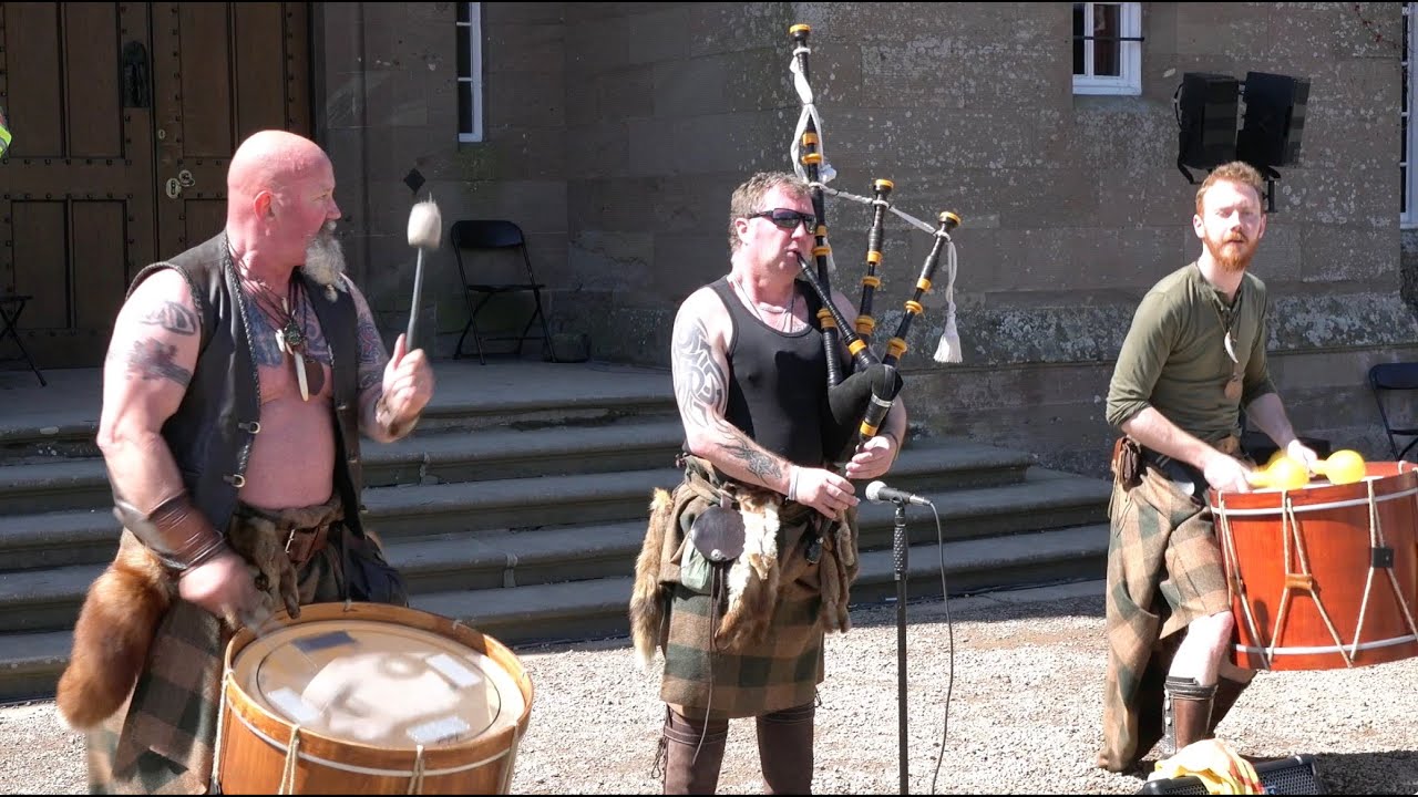 'When The Clans Unite' by Scottish tribal band Clann An Drumma in front of Scone Palace, Scotland