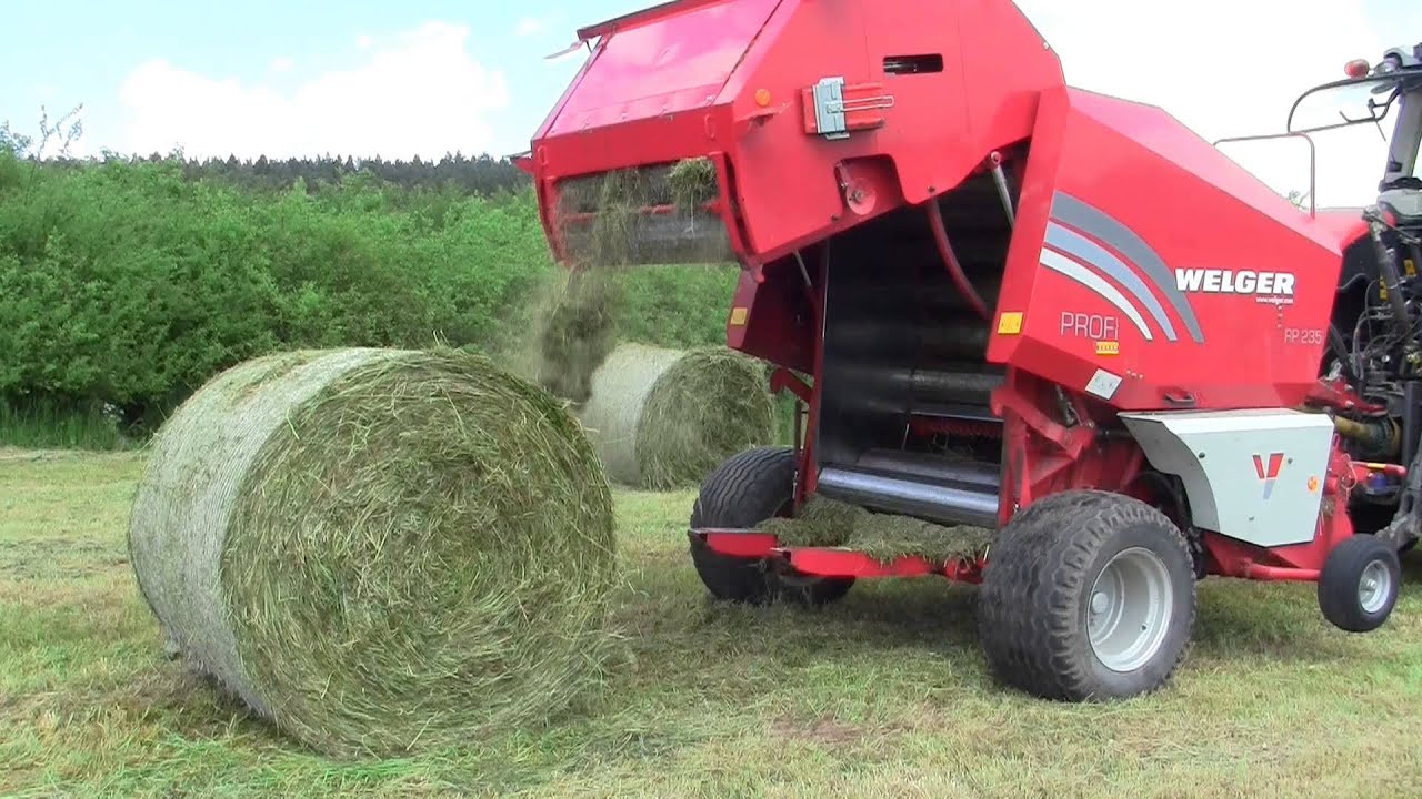 Massey Ferguson 8650 am Siloballenpressen mit Welger RP 235 [HD]