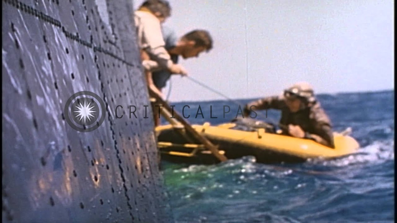 A pilot comes aboard PBM Mariner during air sea rescue work in the Pacific Ocean ...HD Stock Footage