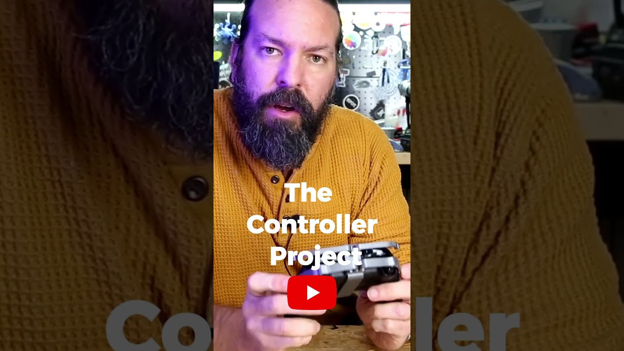 Single guy build a wheeler for his ps5 dualshock for racing games 