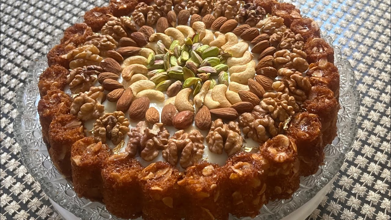 بسبوسة  بالكريمة ماشي بحال البسبوسات فالمول العجيب غير ب2 بيضات خطيرة جربوبها وردو عليا  كتحمق +تمن 